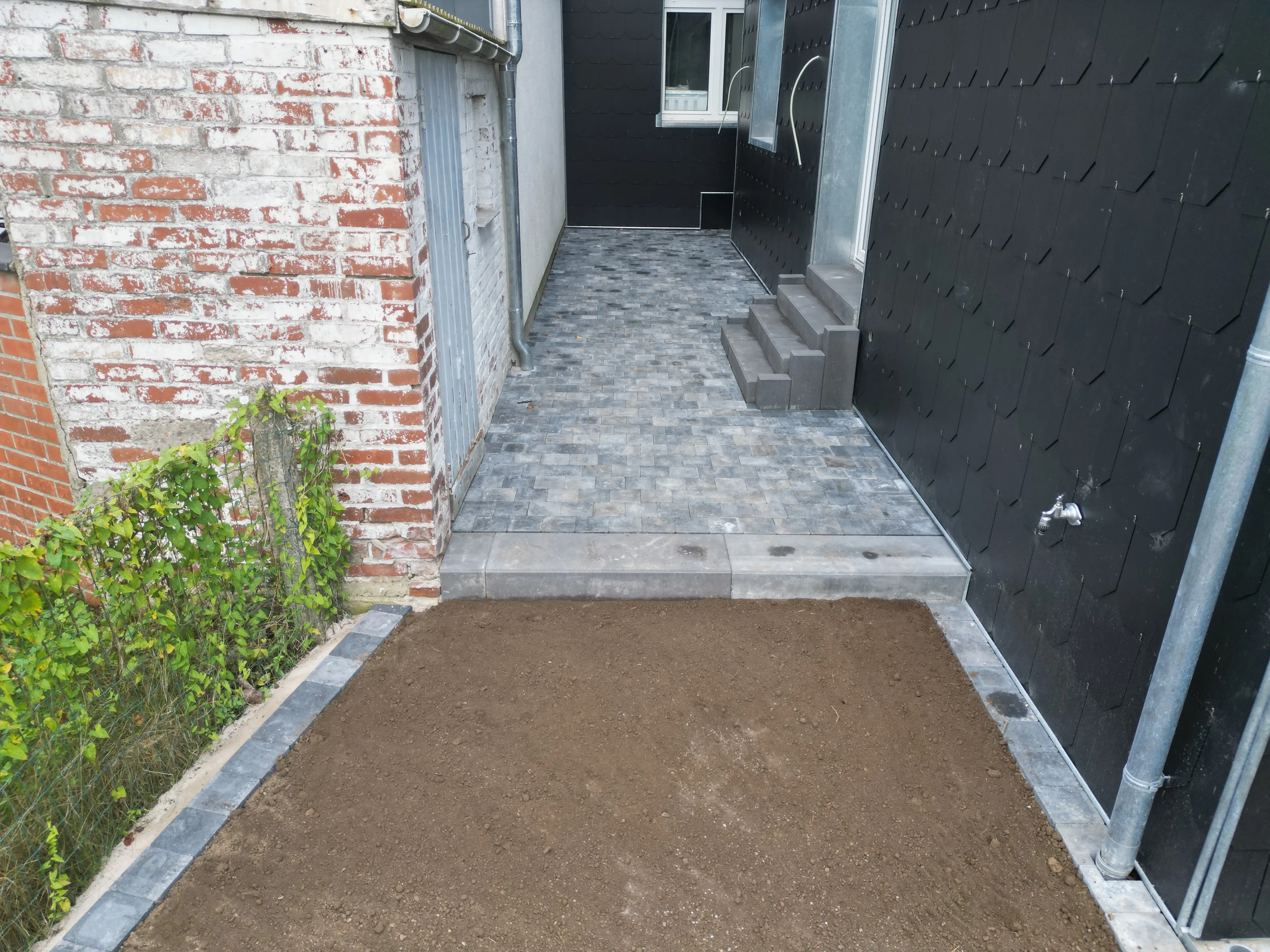 Remise à neuf d'une terrasse de bien locatif à Welkenraedt - Pavage