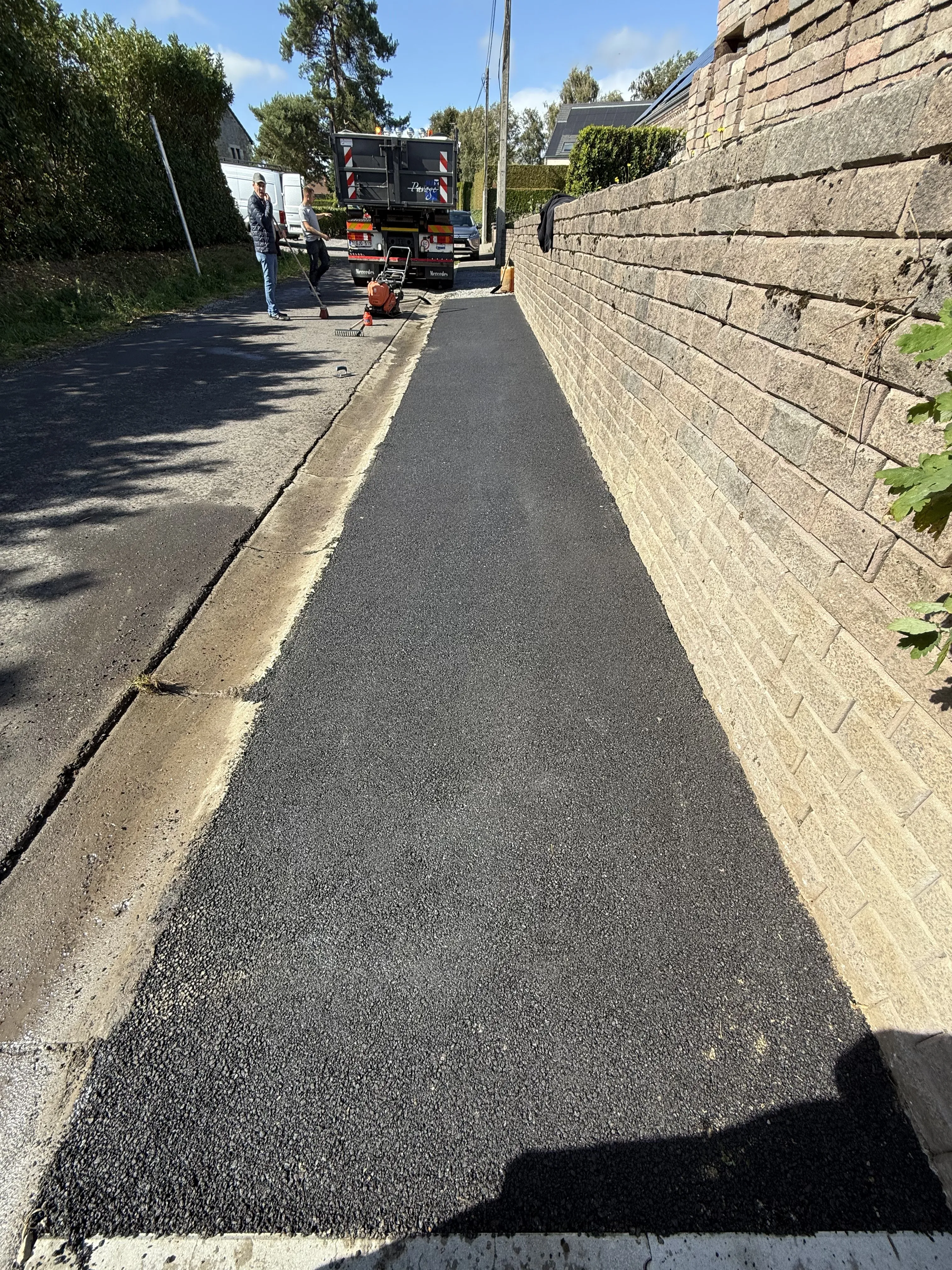 Trottoir en tarmac réalisé par Max Pavage